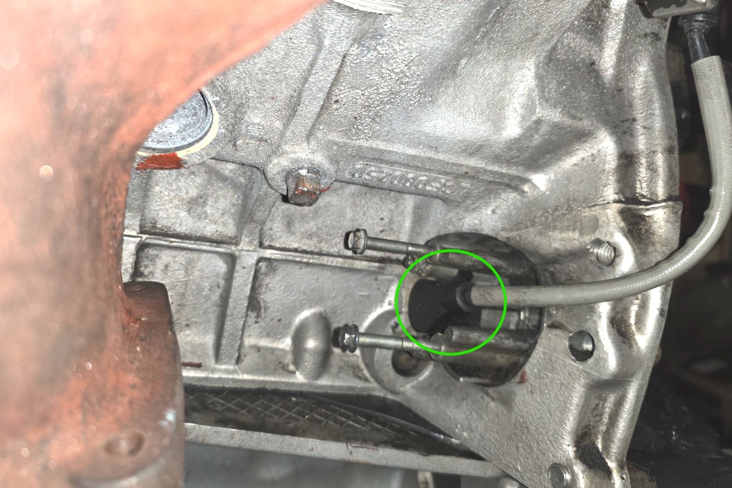 CkPS tucked next to the oil pan and exhaust manifold