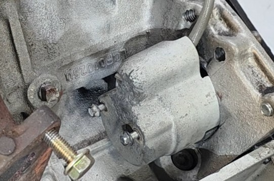 Factory fiberglass heat shield over the sensor